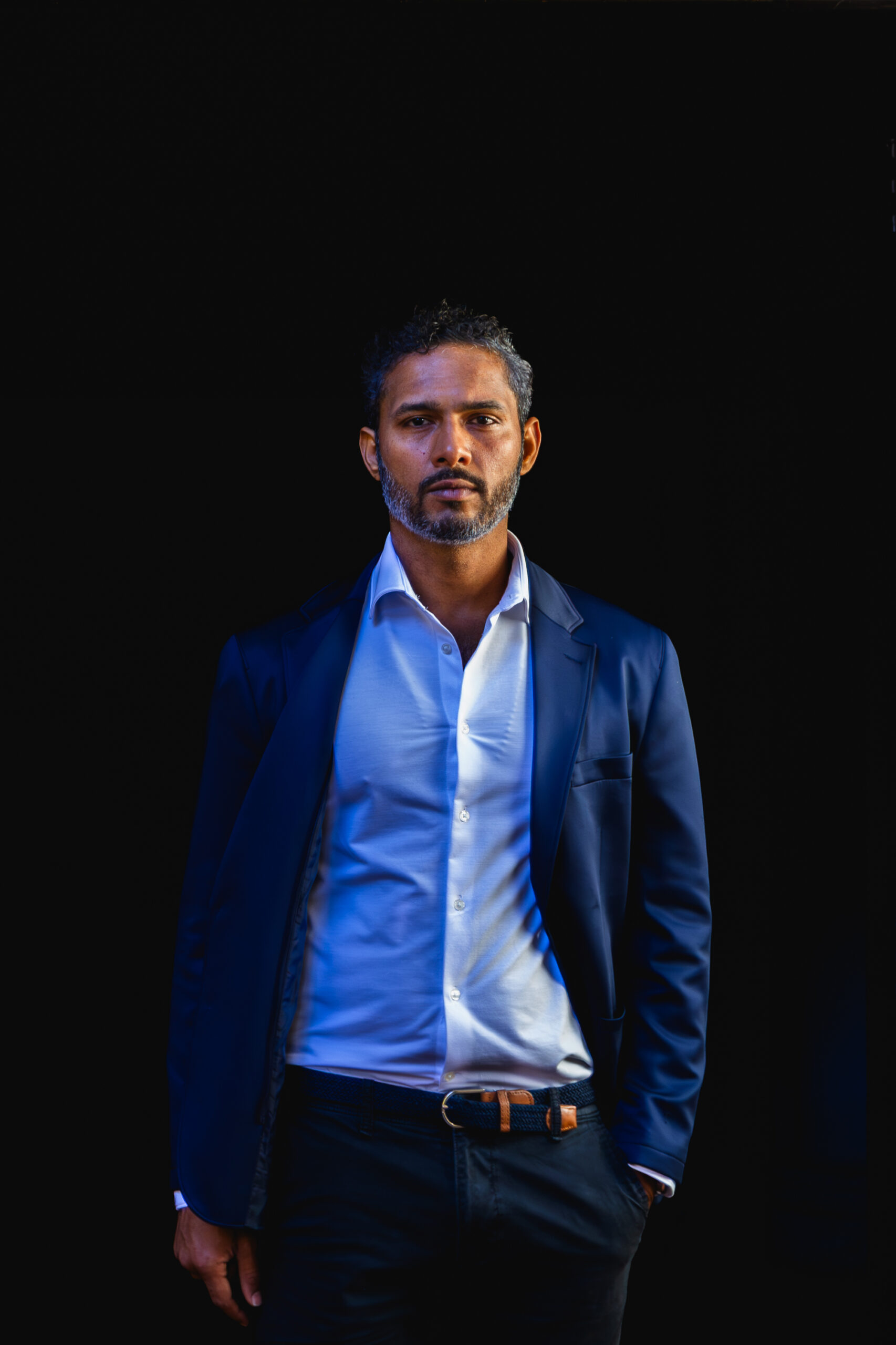 Sabri Sivan wearing a navy jacket